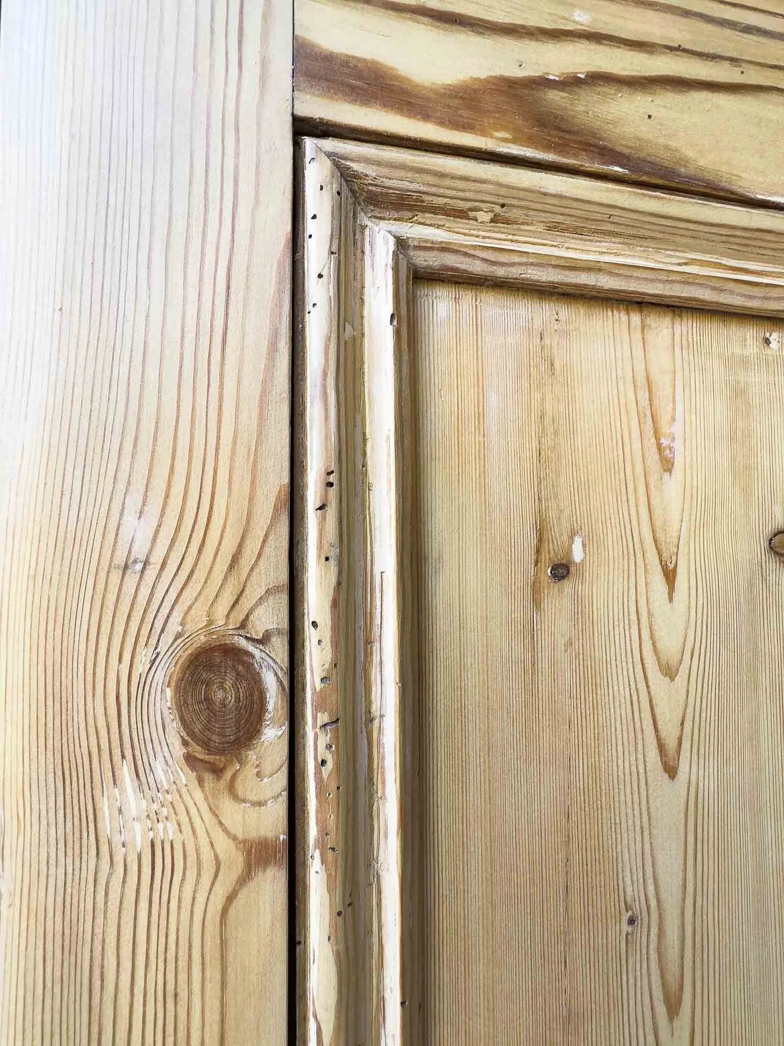 A large antique pine cupboard