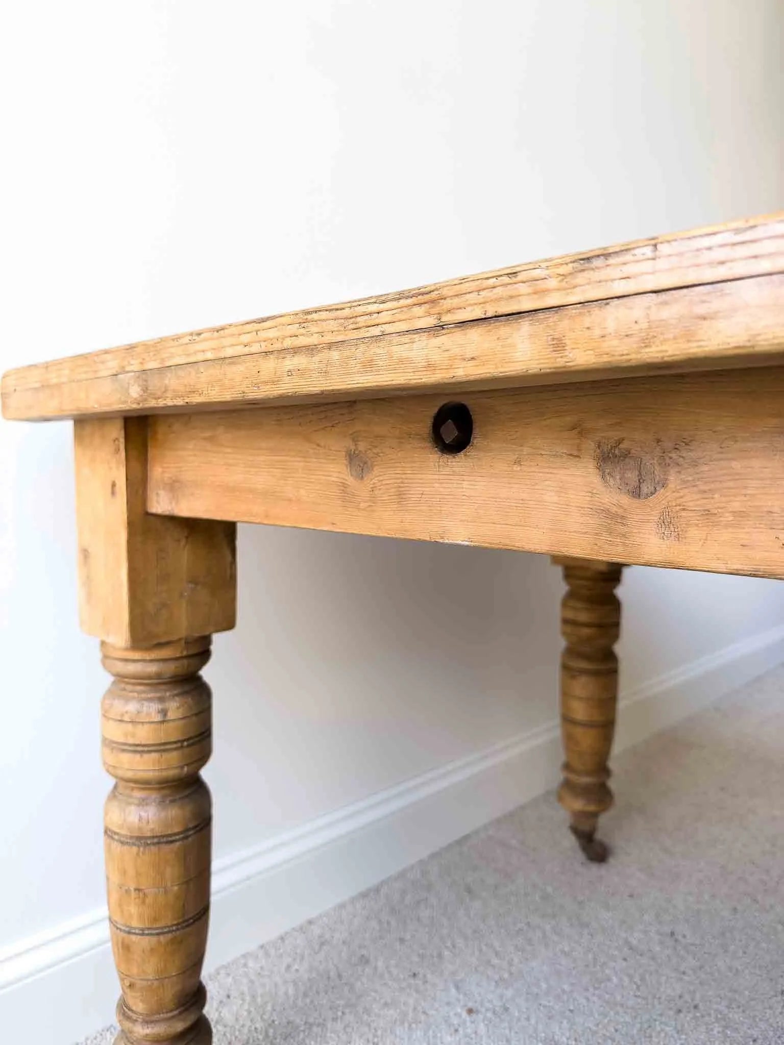 Extendable antique pine table