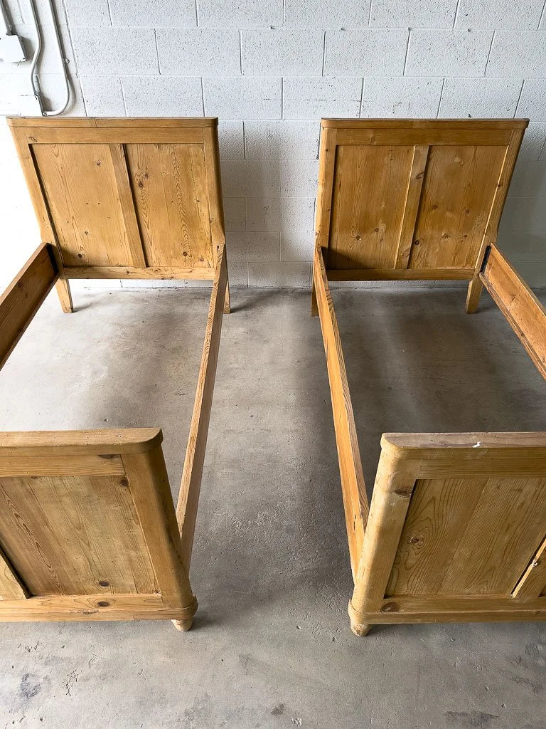Pair of antique pine sleigh beds