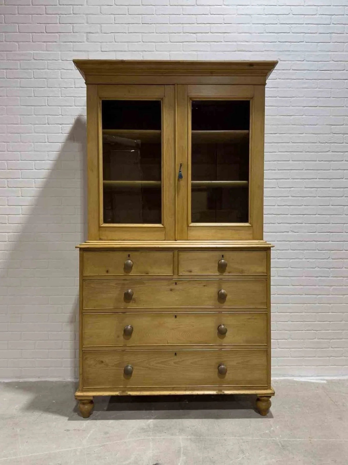 Antique English cupboard with glass doors - House on Horizon