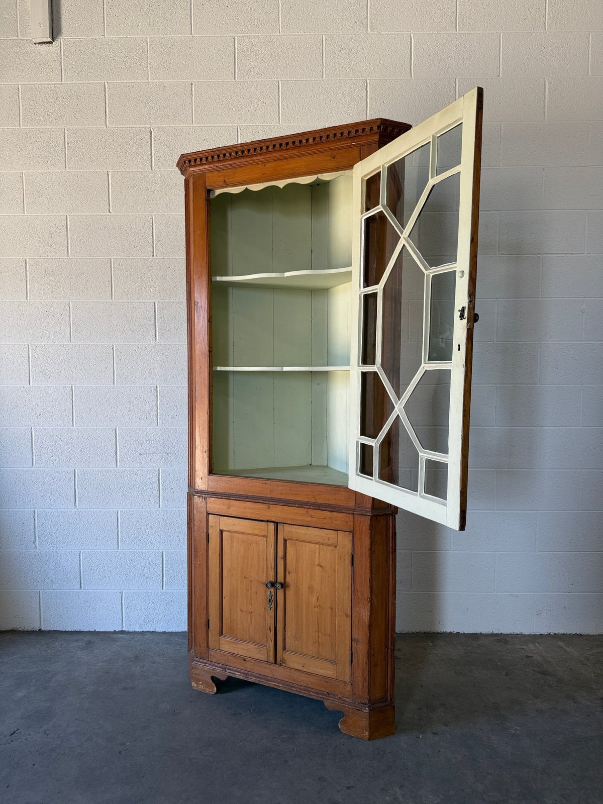 Antique English pine corner cabinet with glazed astragal door - House on Horizon