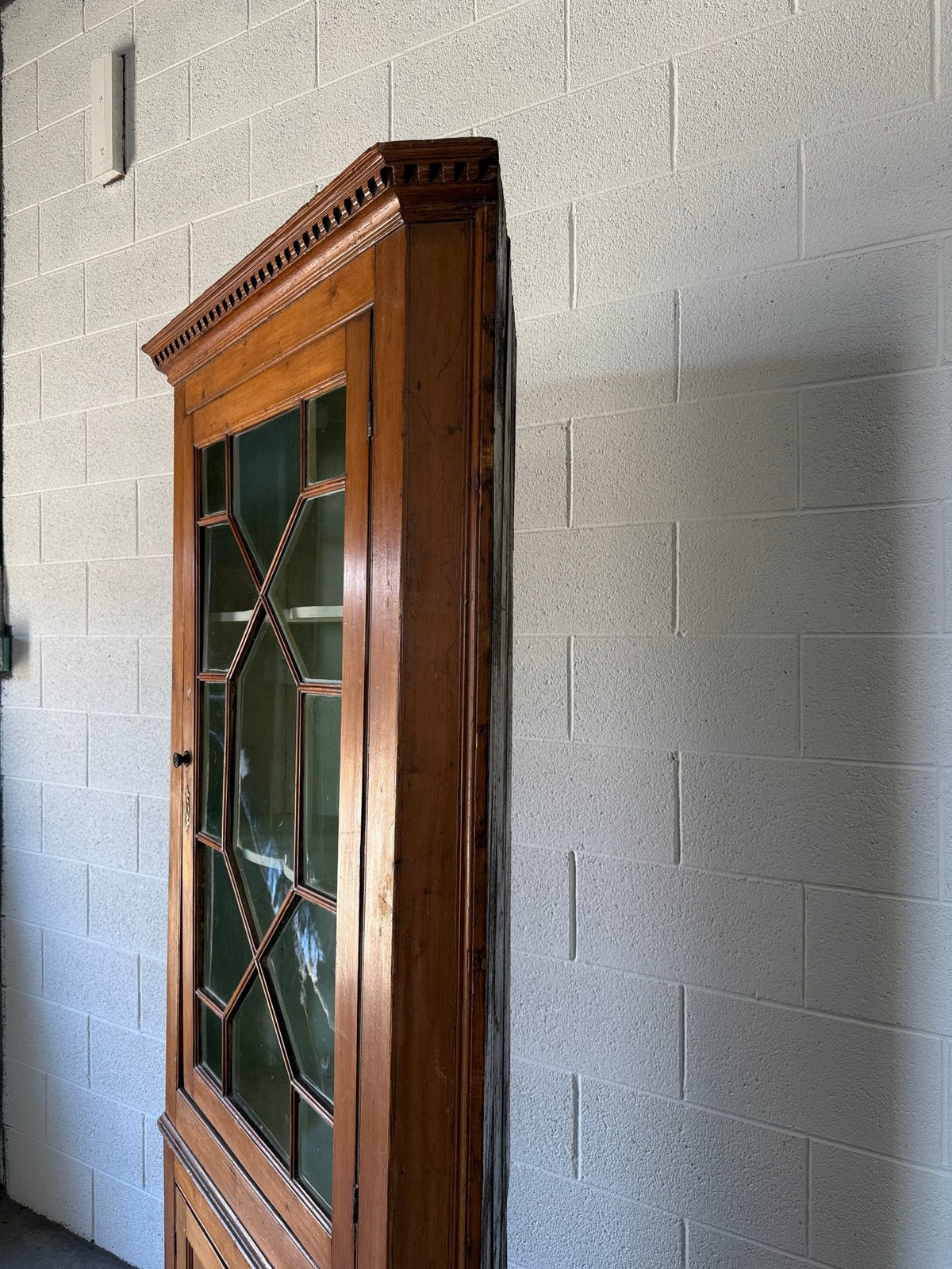 Antique English pine corner cabinet with glazed astragal door - House on Horizon