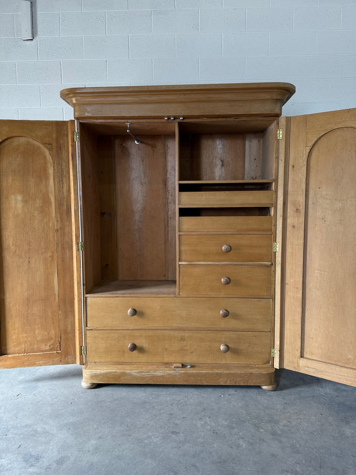 Antique English pine wardrobe with arched panel doors and fitted interior - House on Horizon