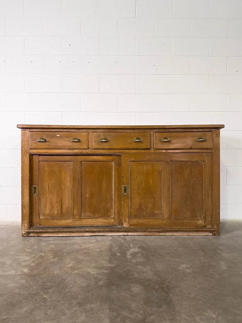 English pine sideboard with sliding doors and brass hardware - House on Horizon