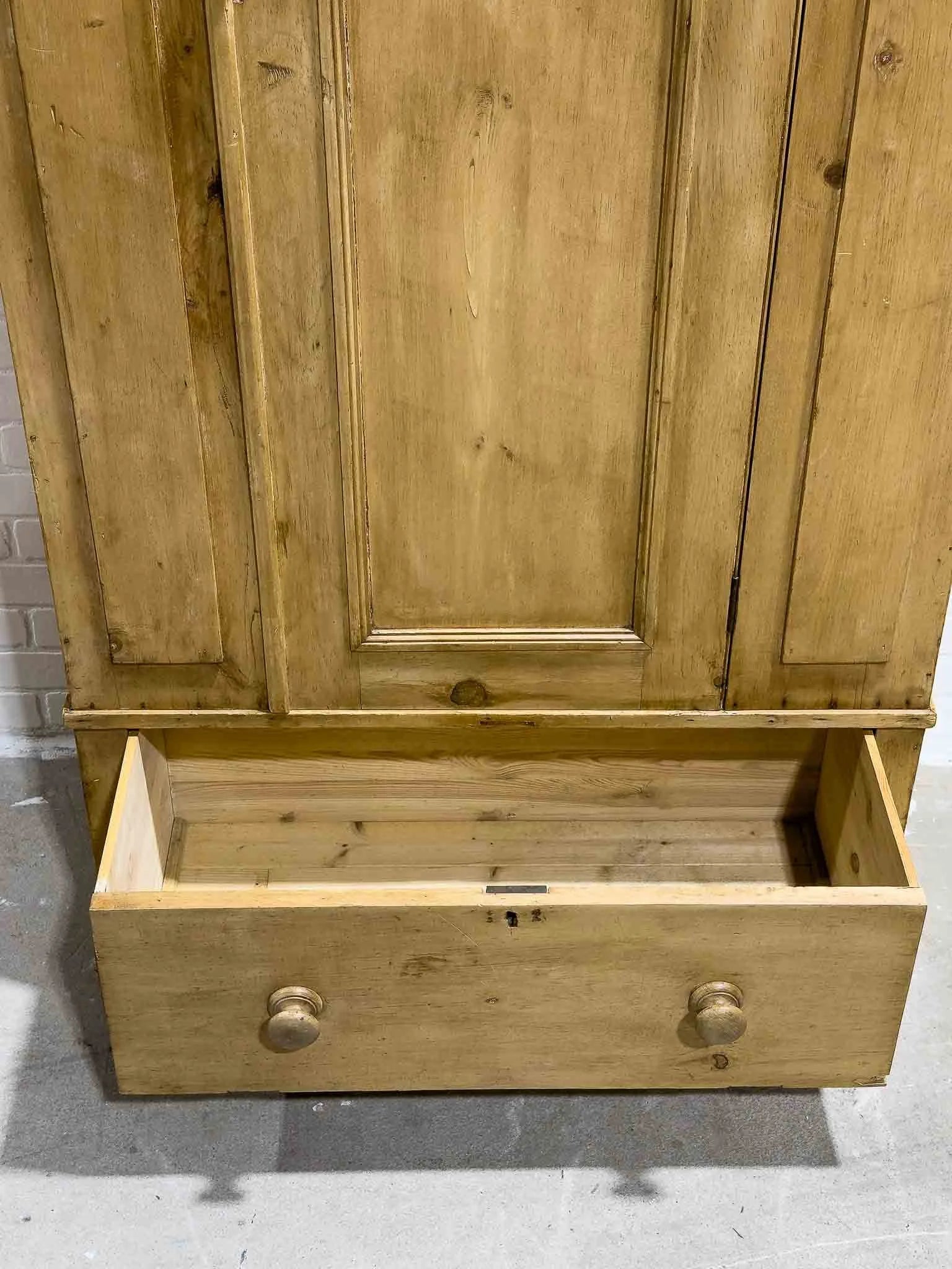 Victorian pine wardrobe with a drawer