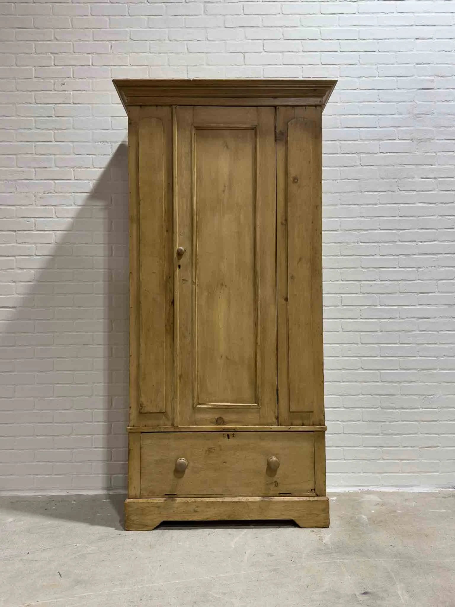 Victorian pine wardrobe with a drawer