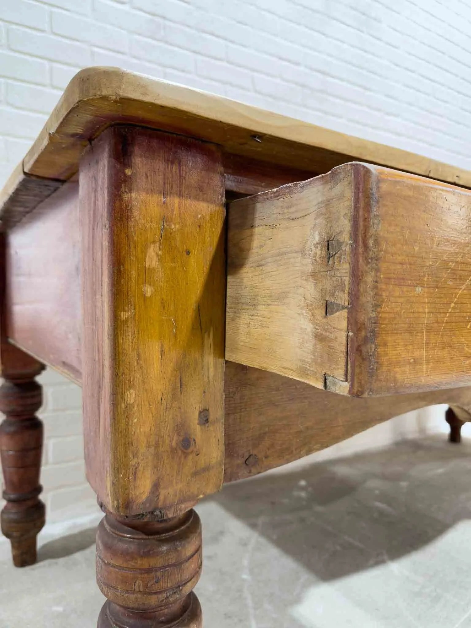 Antique dairy table with turned legs