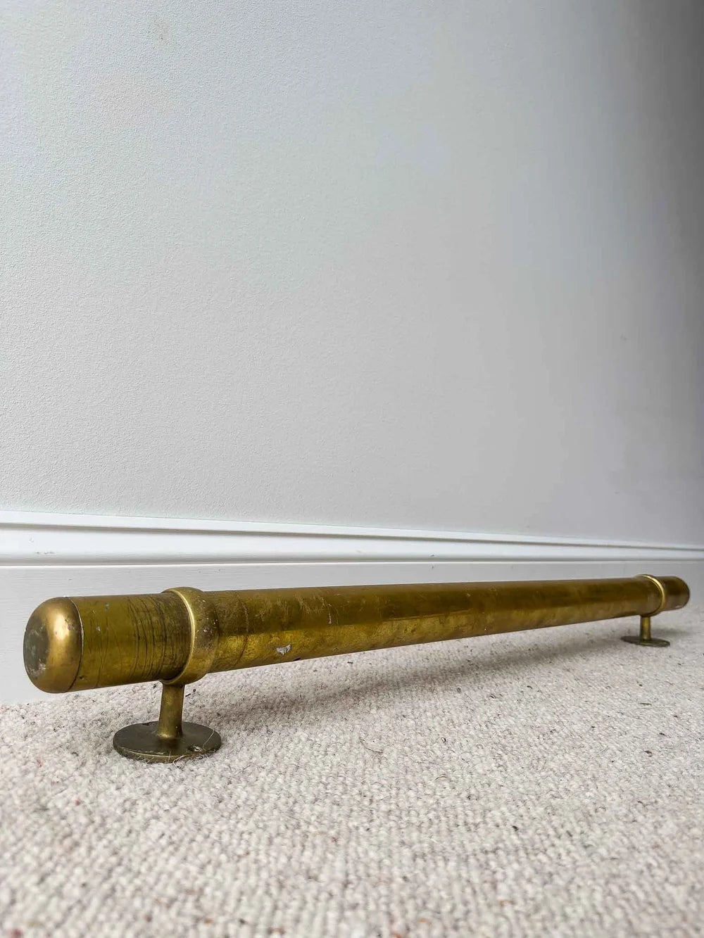 Three vintage brass foot rails