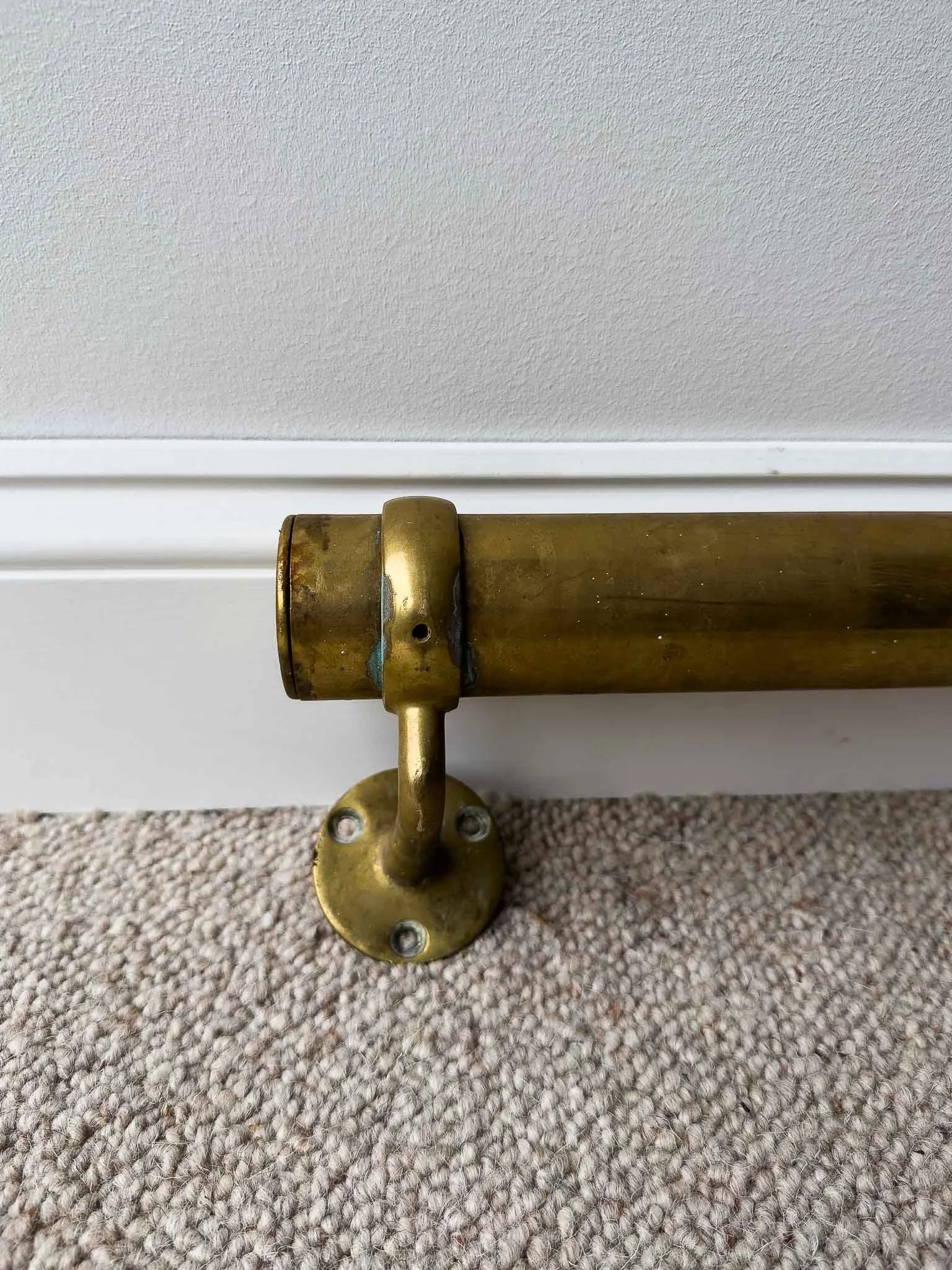 Long antique brass foot rail