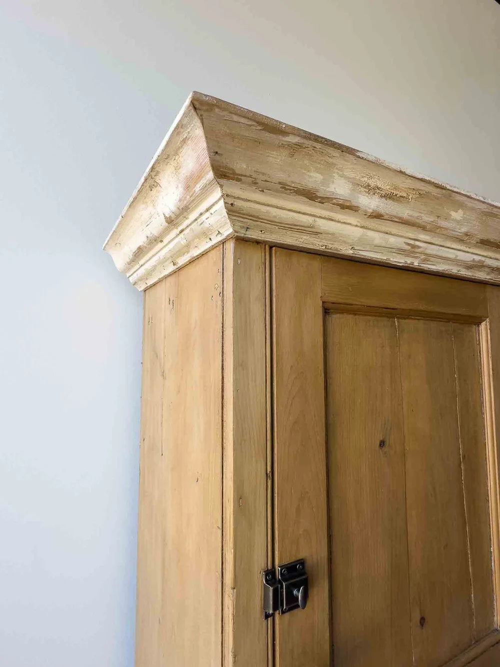Tall English antique pine cupboard