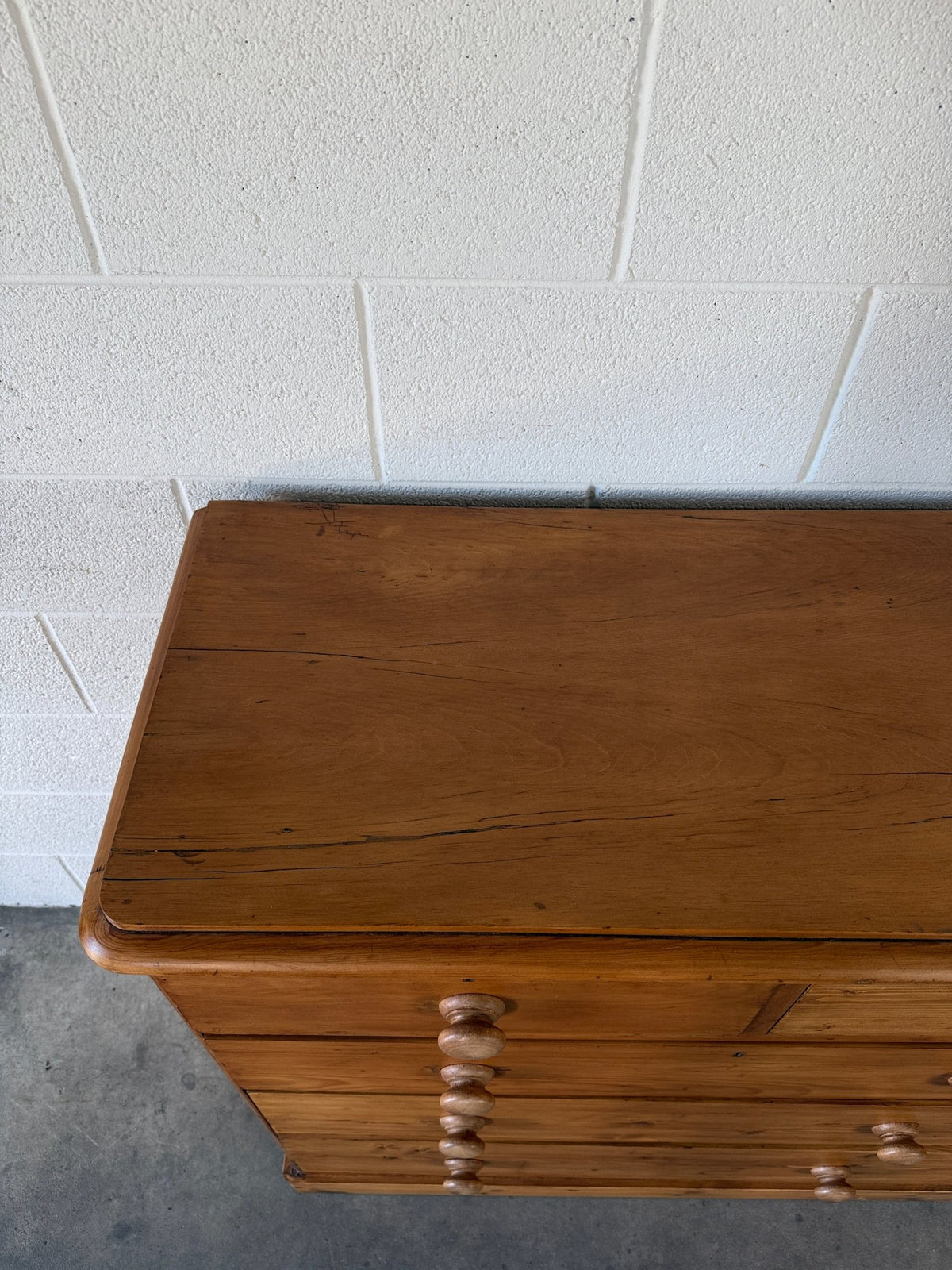 Solid antique pine chest of drawers set on plinth base - House on Horizon