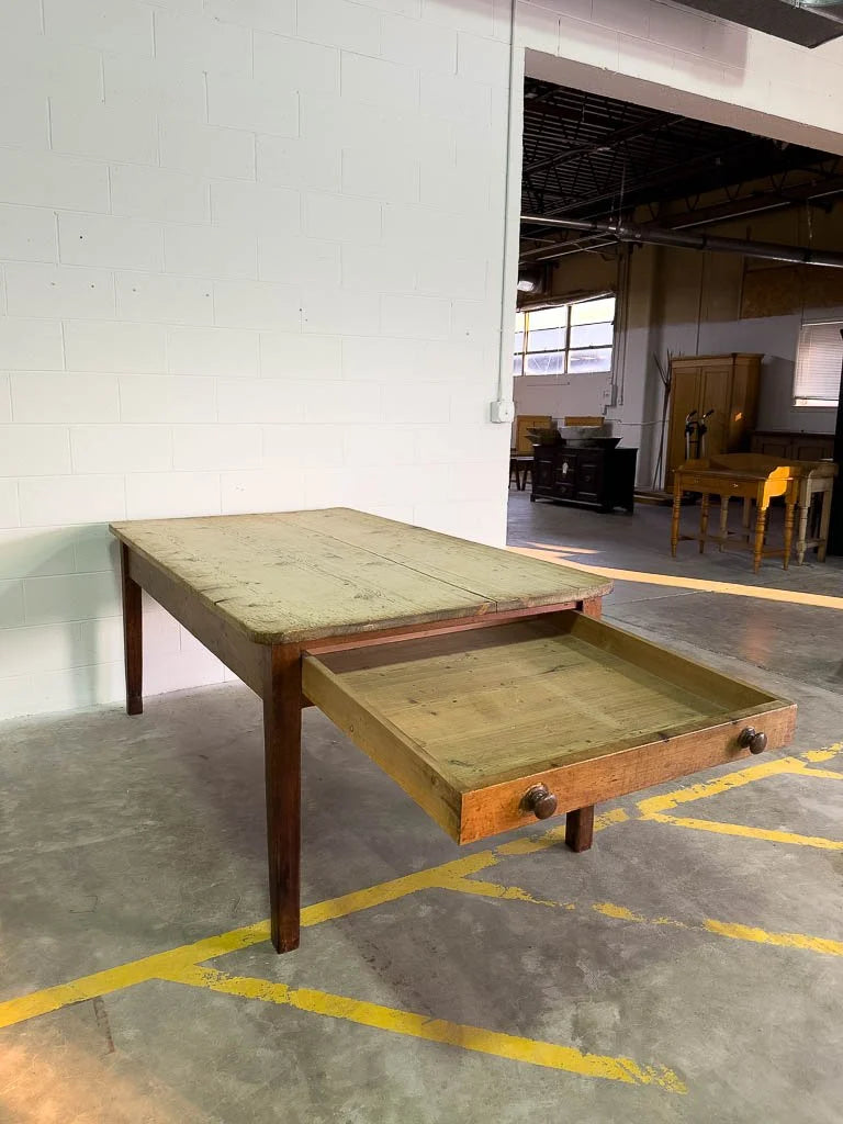 Antique English dining table with drawers