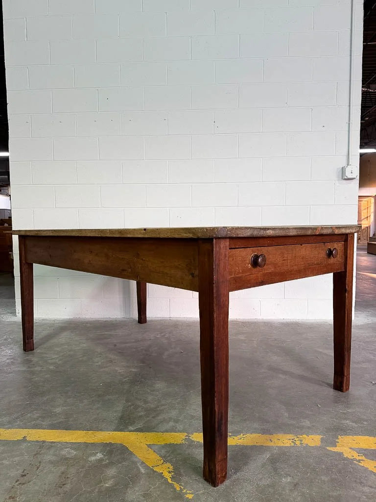 Antique English dining table with drawers