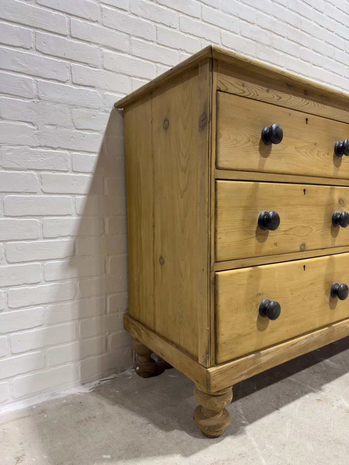 Victorian pine sideboard with dark knobs - House on Horizon