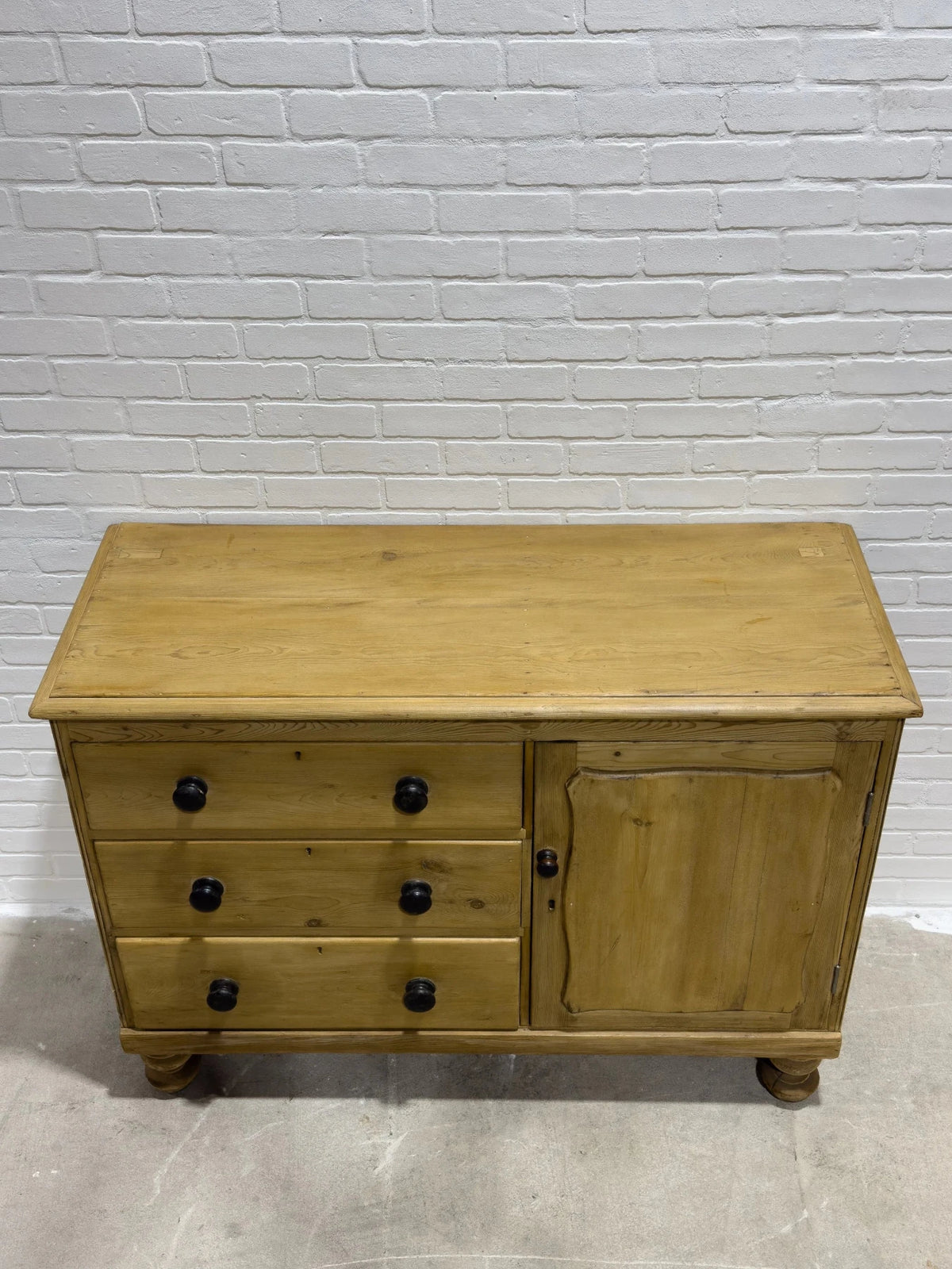 Victorian pine sideboard with dark knobs - House on Horizon
