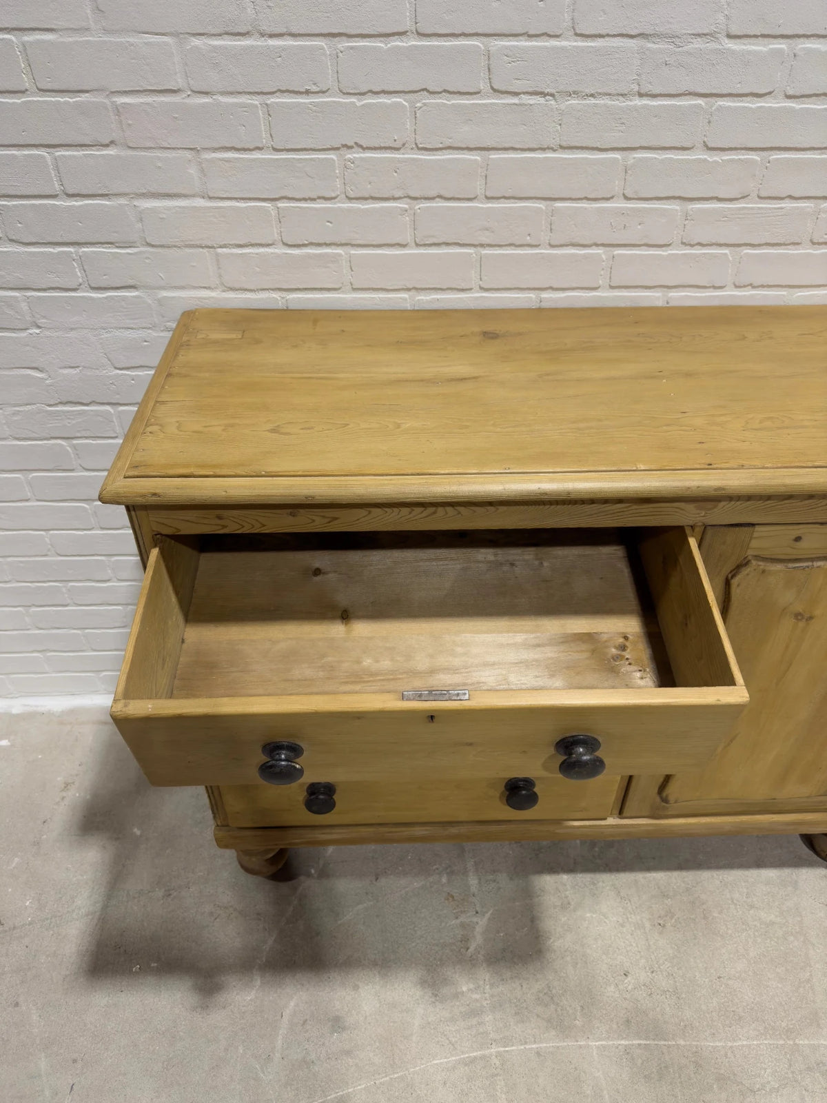 Victorian pine sideboard with dark knobs - House on Horizon