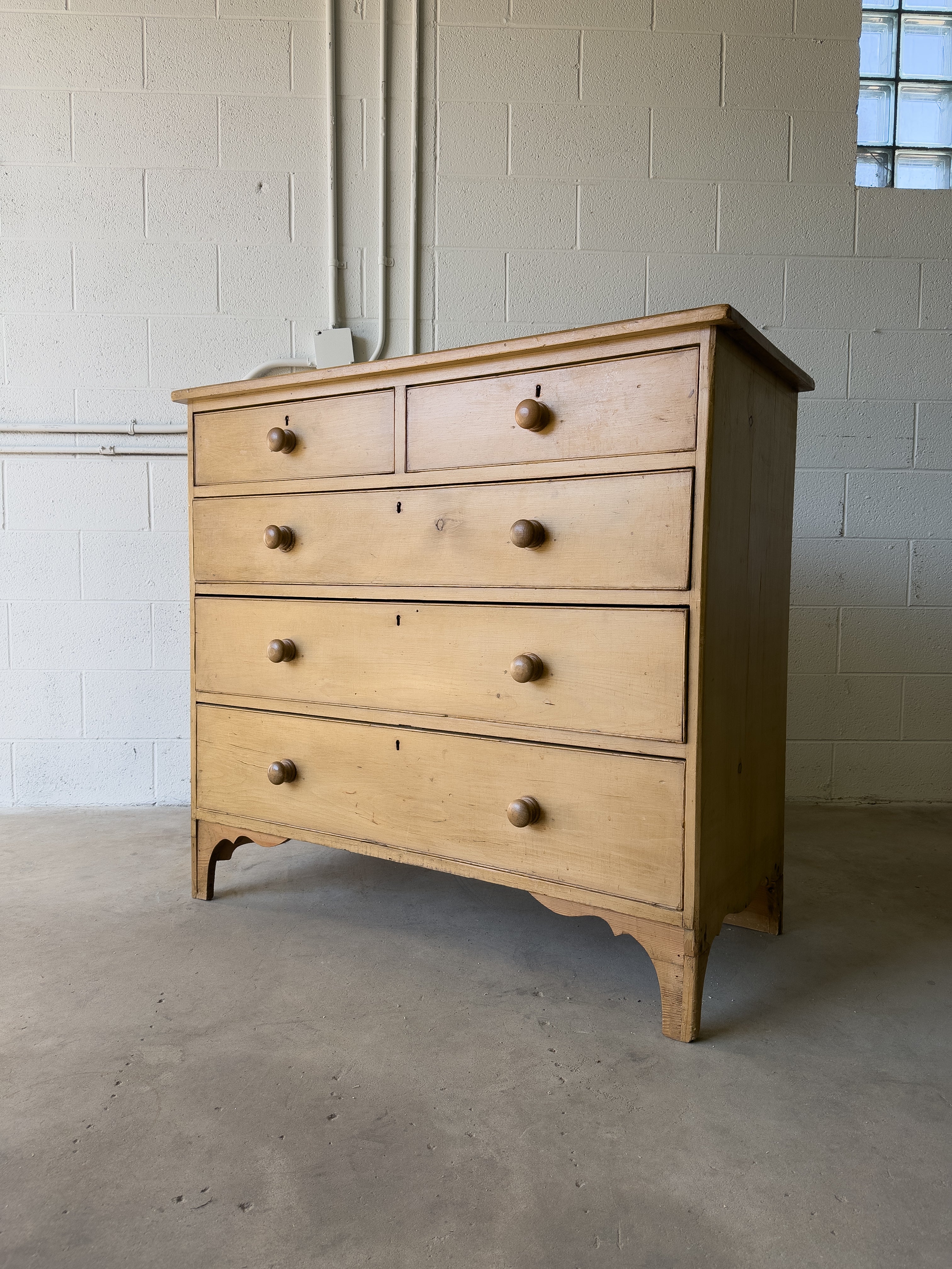 Antique English pine dresser on bracket feet