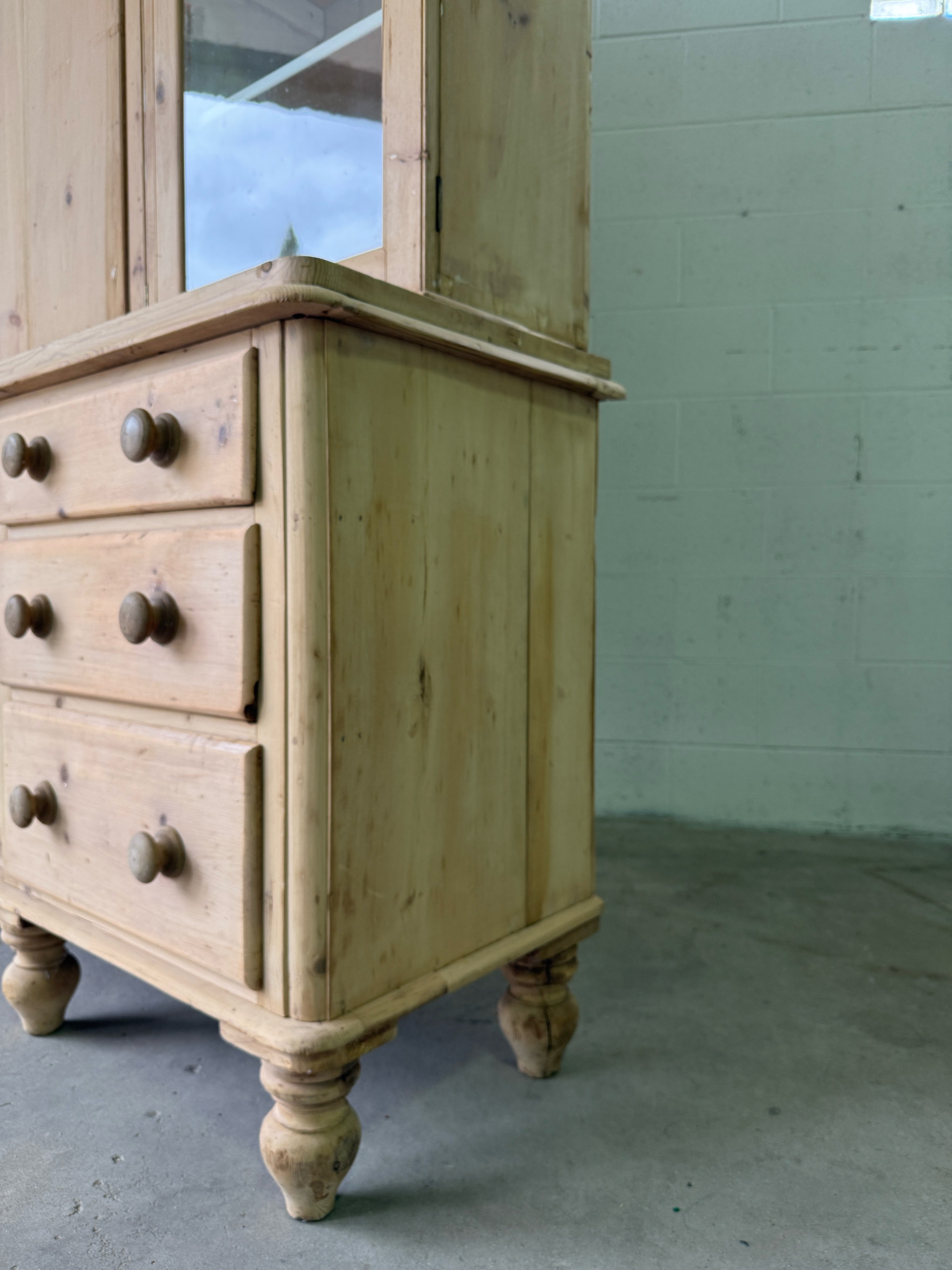 Antique pine housekeepers cupboard with wavy glass