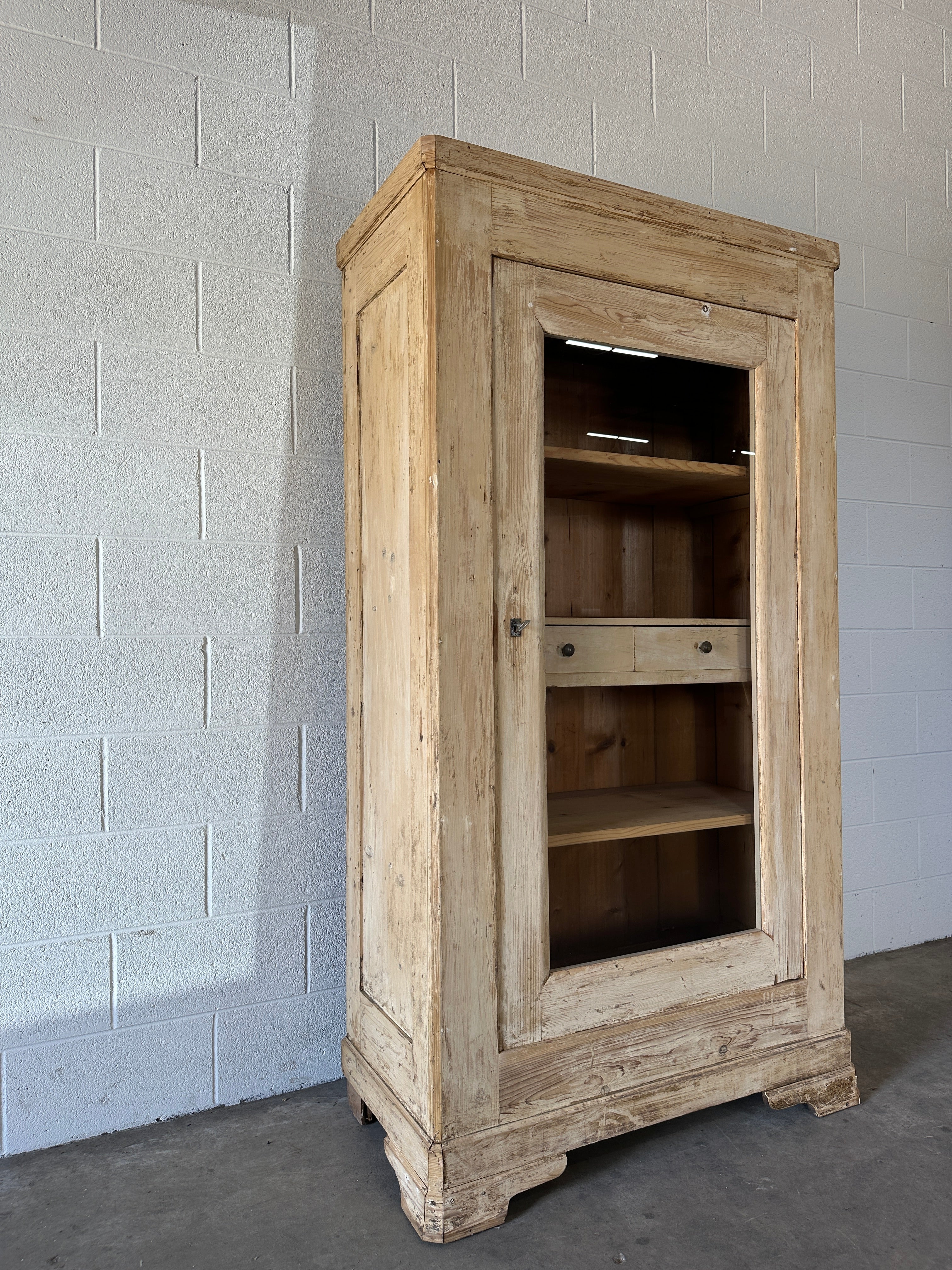 Antique French cupboard with glass door