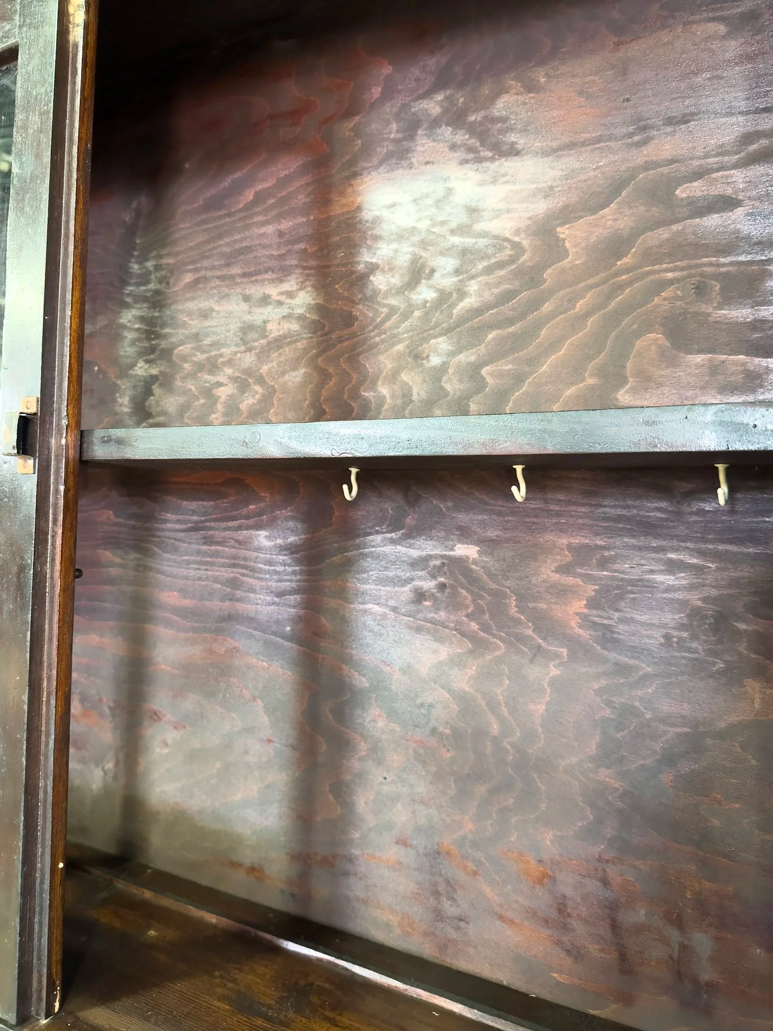 Scumbled pine hutch with wavy glass