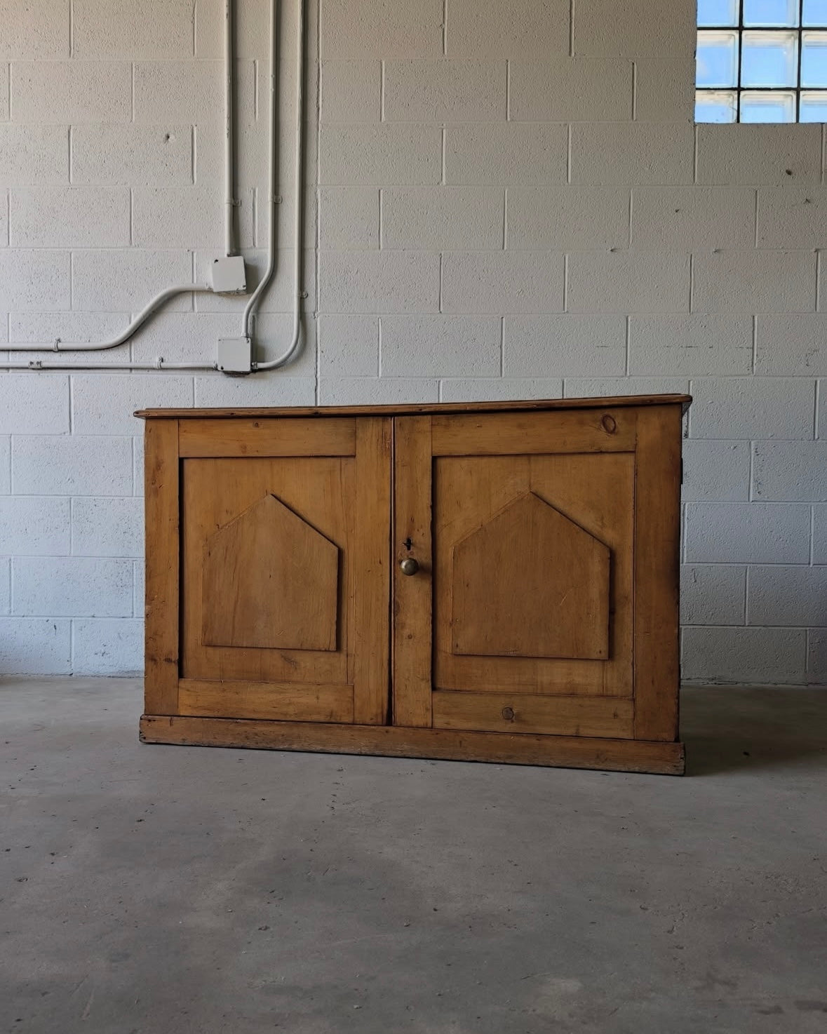 Small antique pine two-door cupboard or sideboard