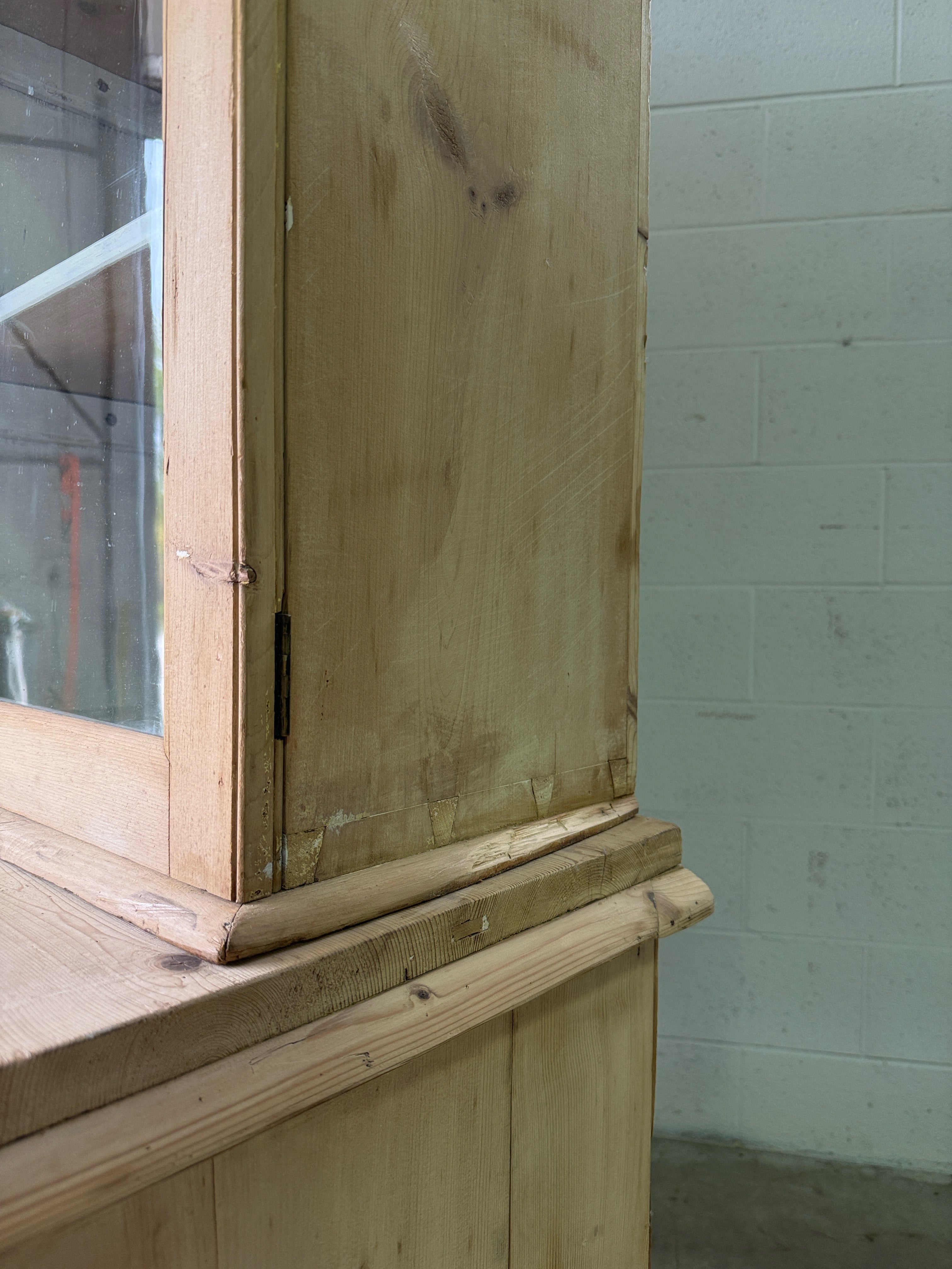 Antique pine housekeepers cupboard with wavy glass