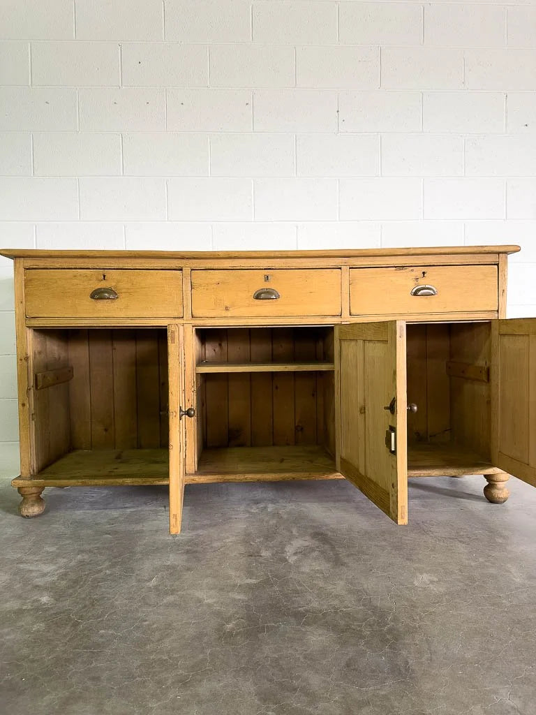 Tall antique English pine sideboard with drawers