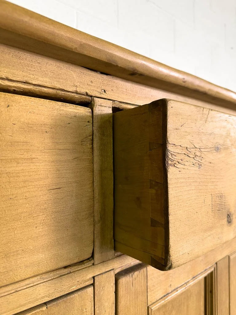 Tall antique English pine sideboard with drawers