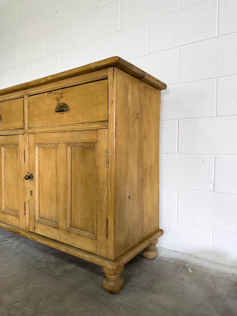 Tall antique English pine sideboard with drawers