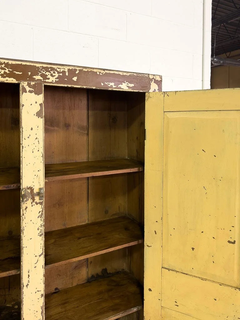 Primitive cupboard in chippy paint