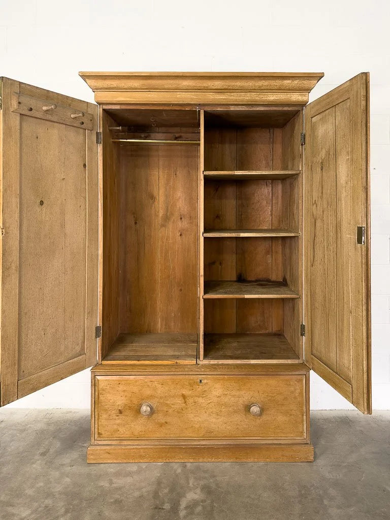 Antique English pine wardrobe or cupboard with a drawer