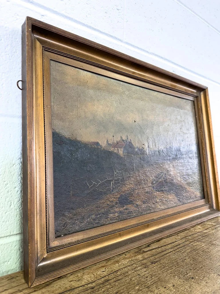 Antique oil painting of a boat on the shore