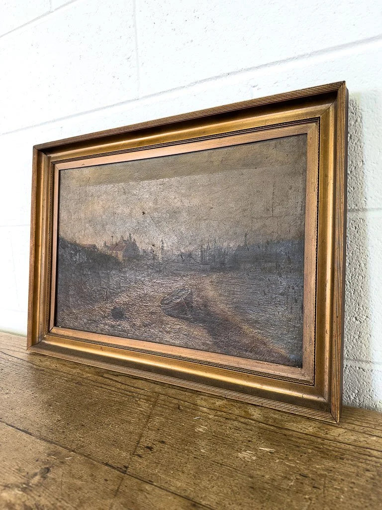 Antique oil painting of a boat on the shore