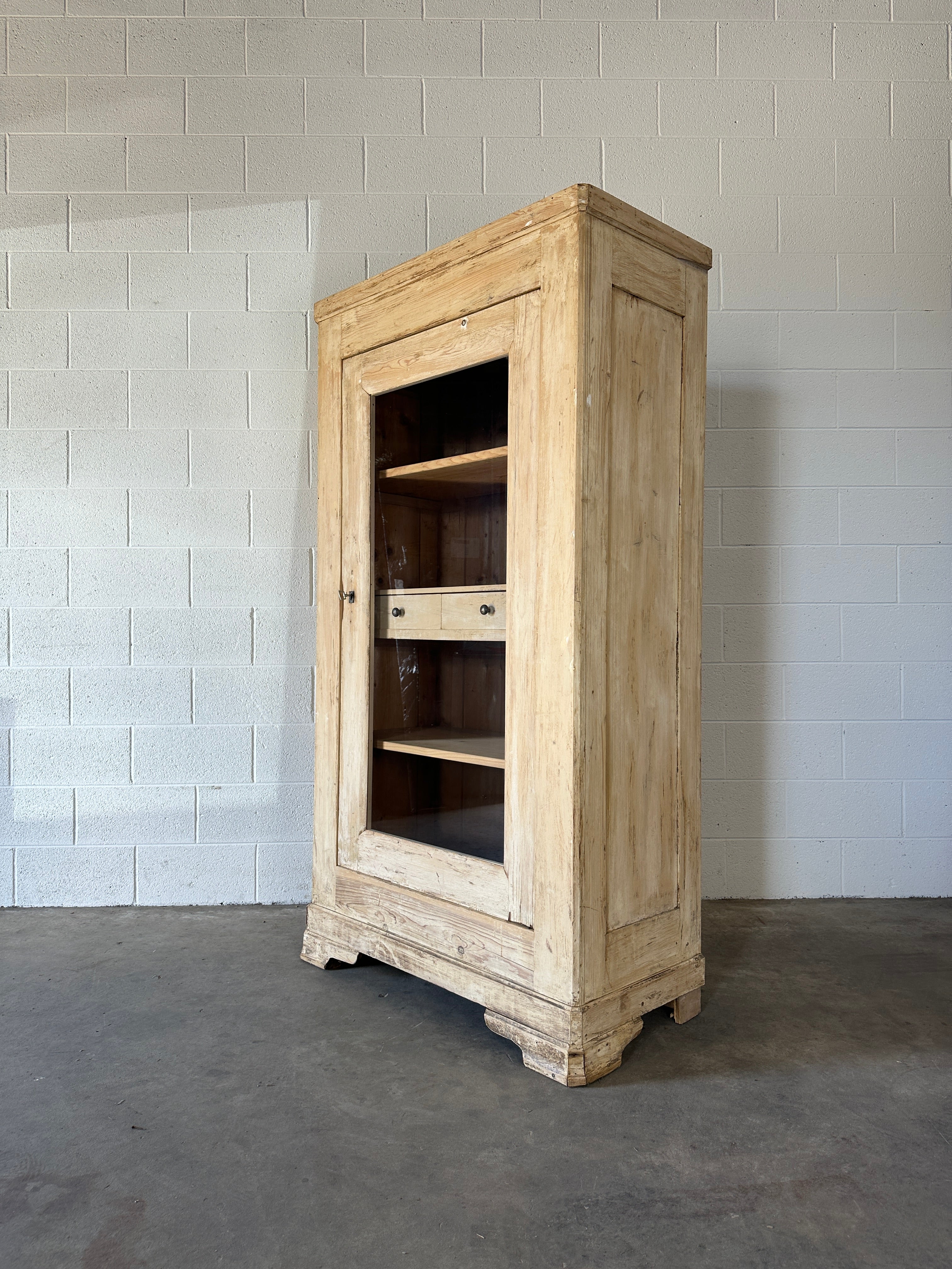 Antique French cupboard with glass door