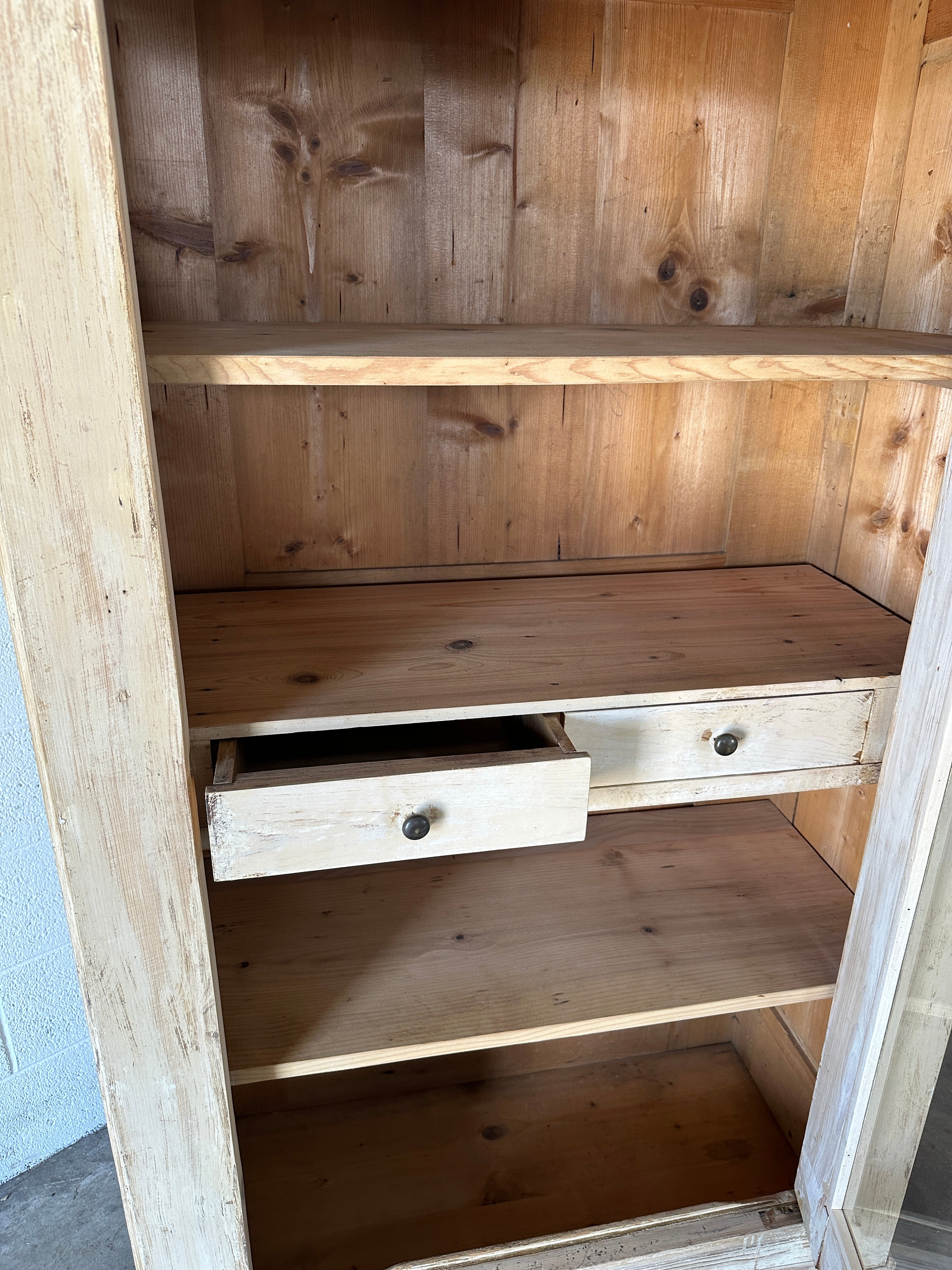 Antique French cupboard with glass door