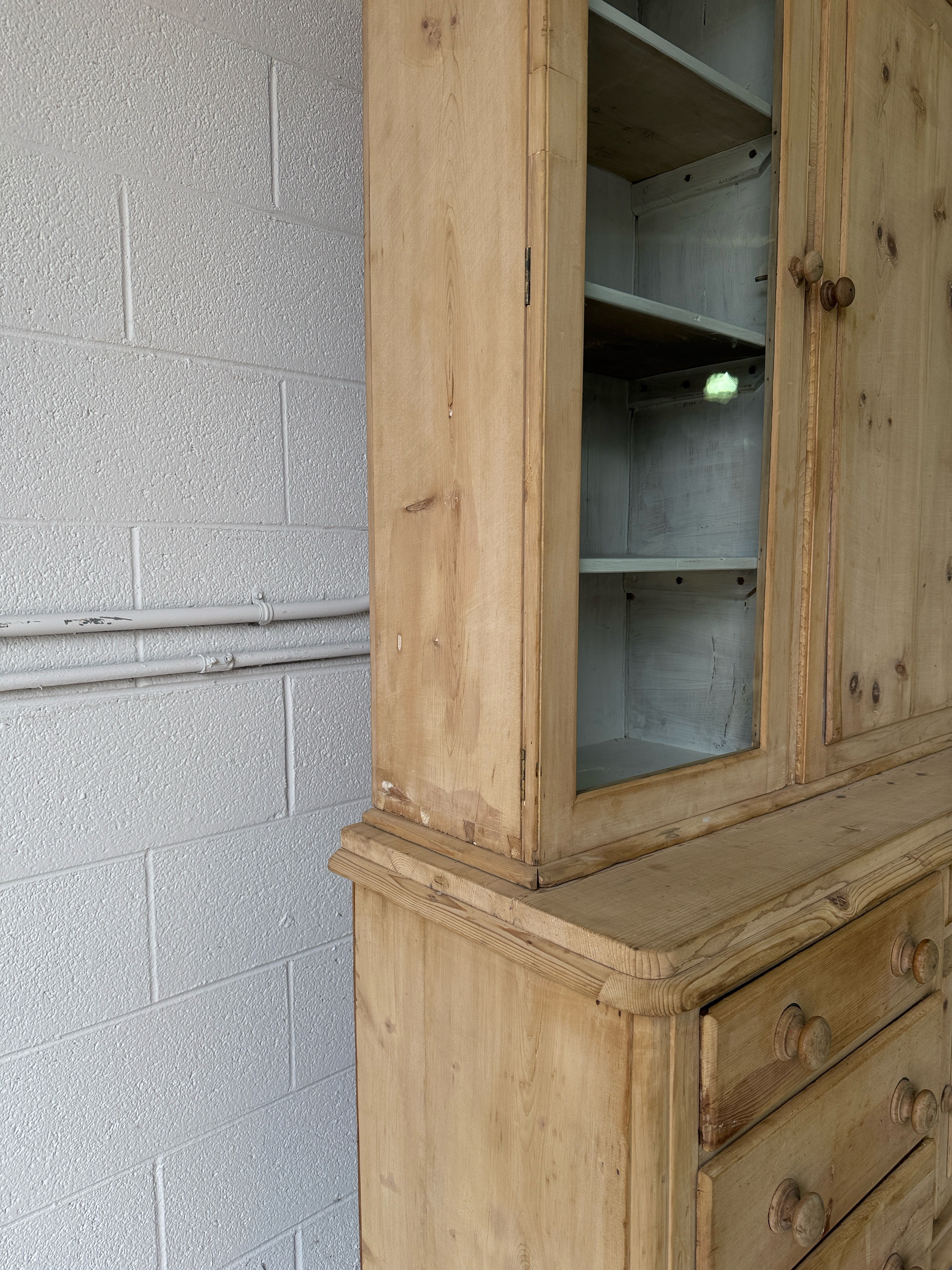 Antique pine housekeepers cupboard with wavy glass