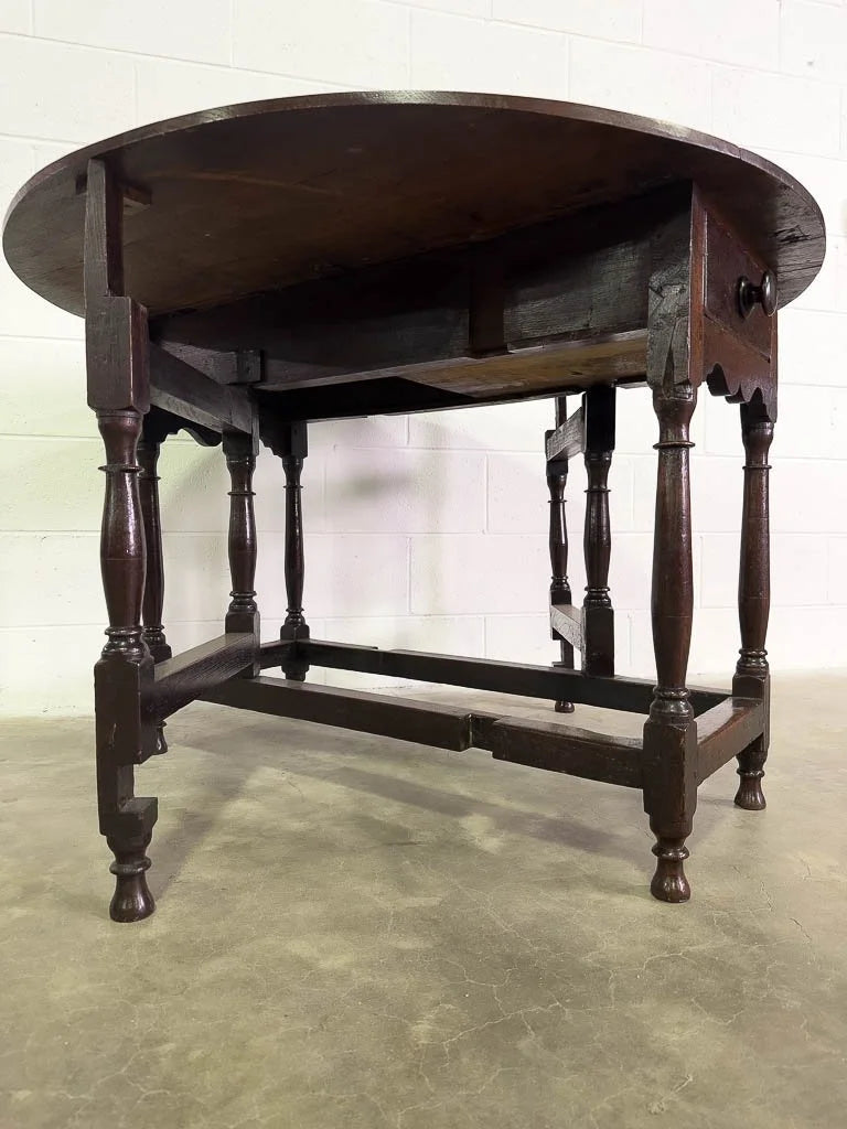 Antique oak gate leg table with drawer