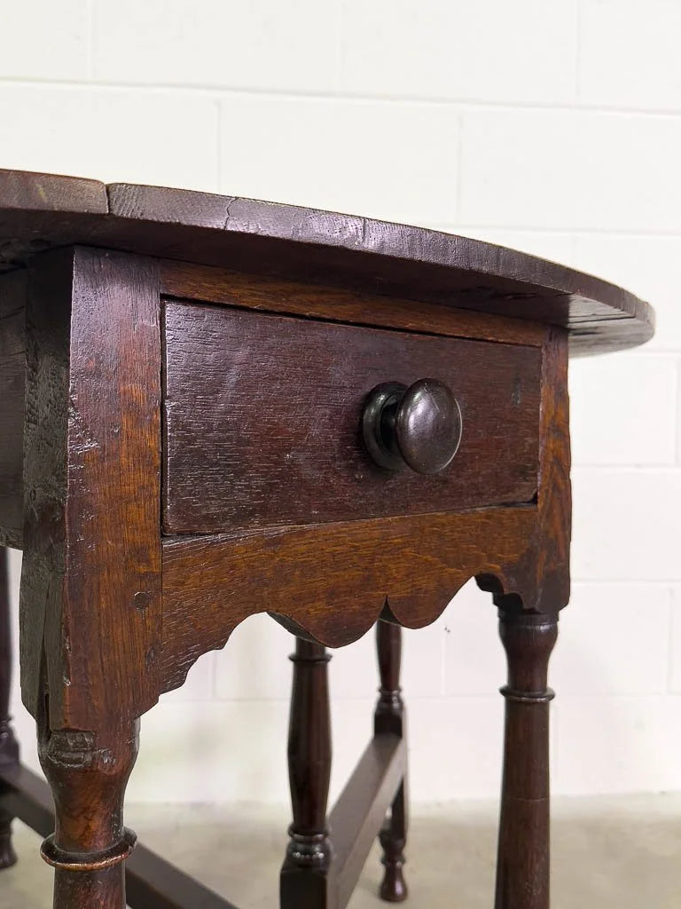 Antique oak gate leg table with drawer