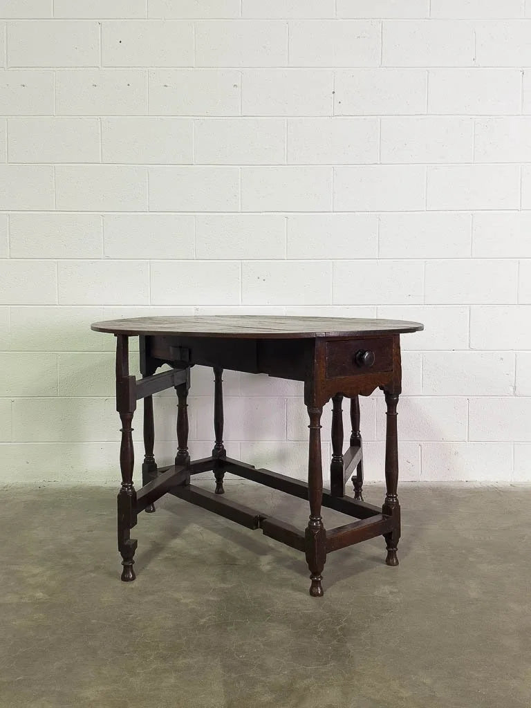 Antique oak gate leg table with drawer