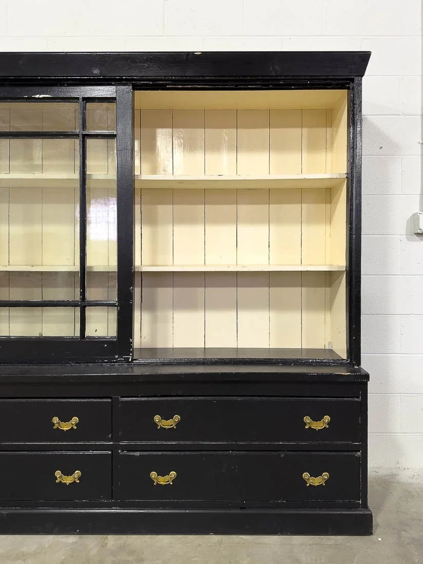 Antique bookcase with sliding glass doors
