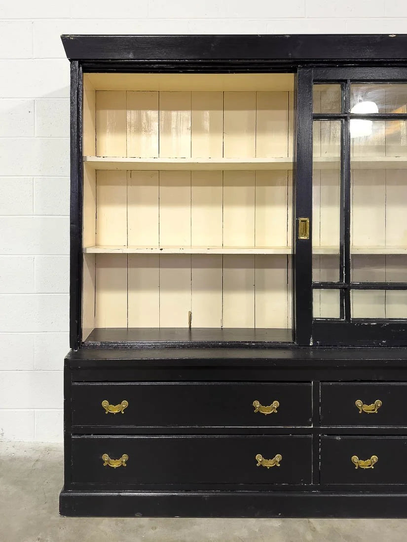 Antique bookcase with sliding glass doors