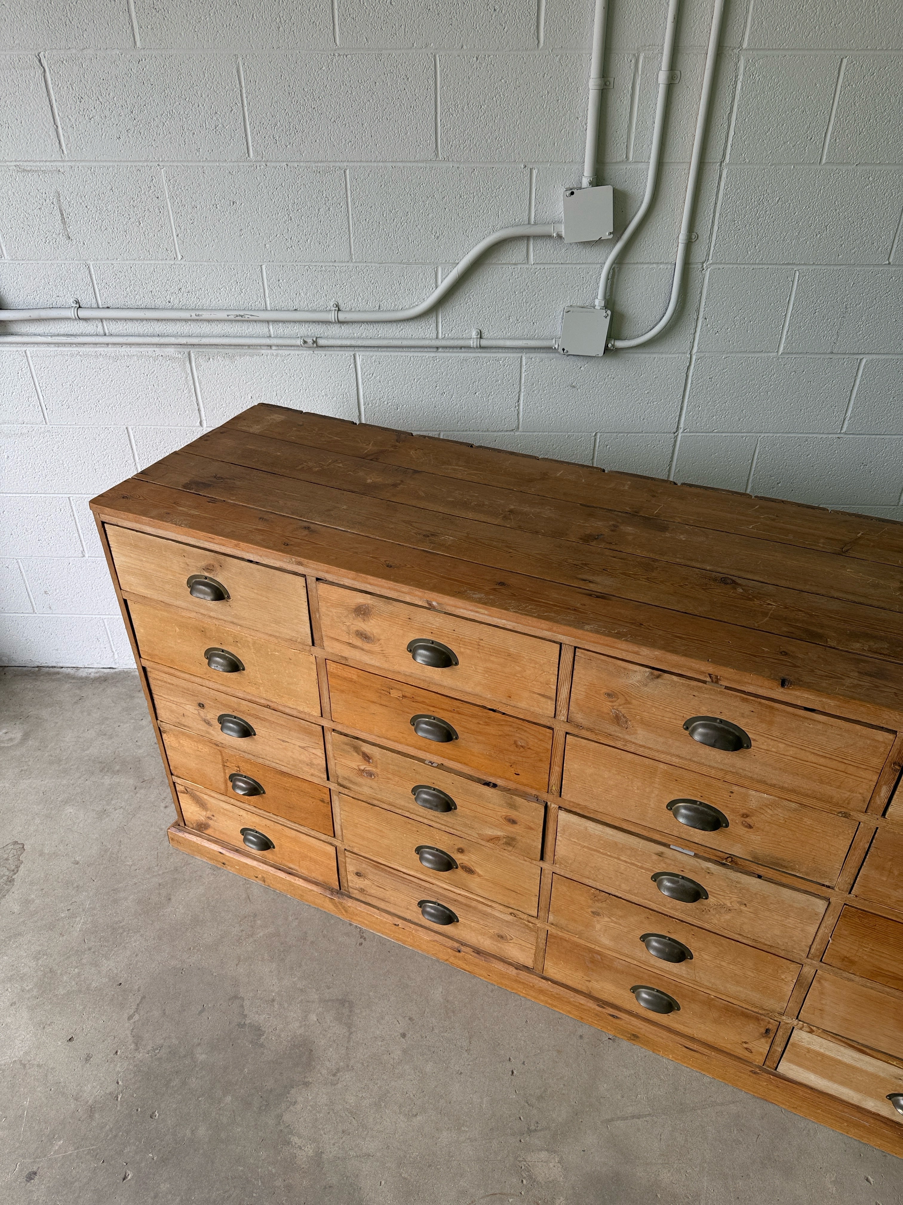 Antique European bank of haberdashery drawers