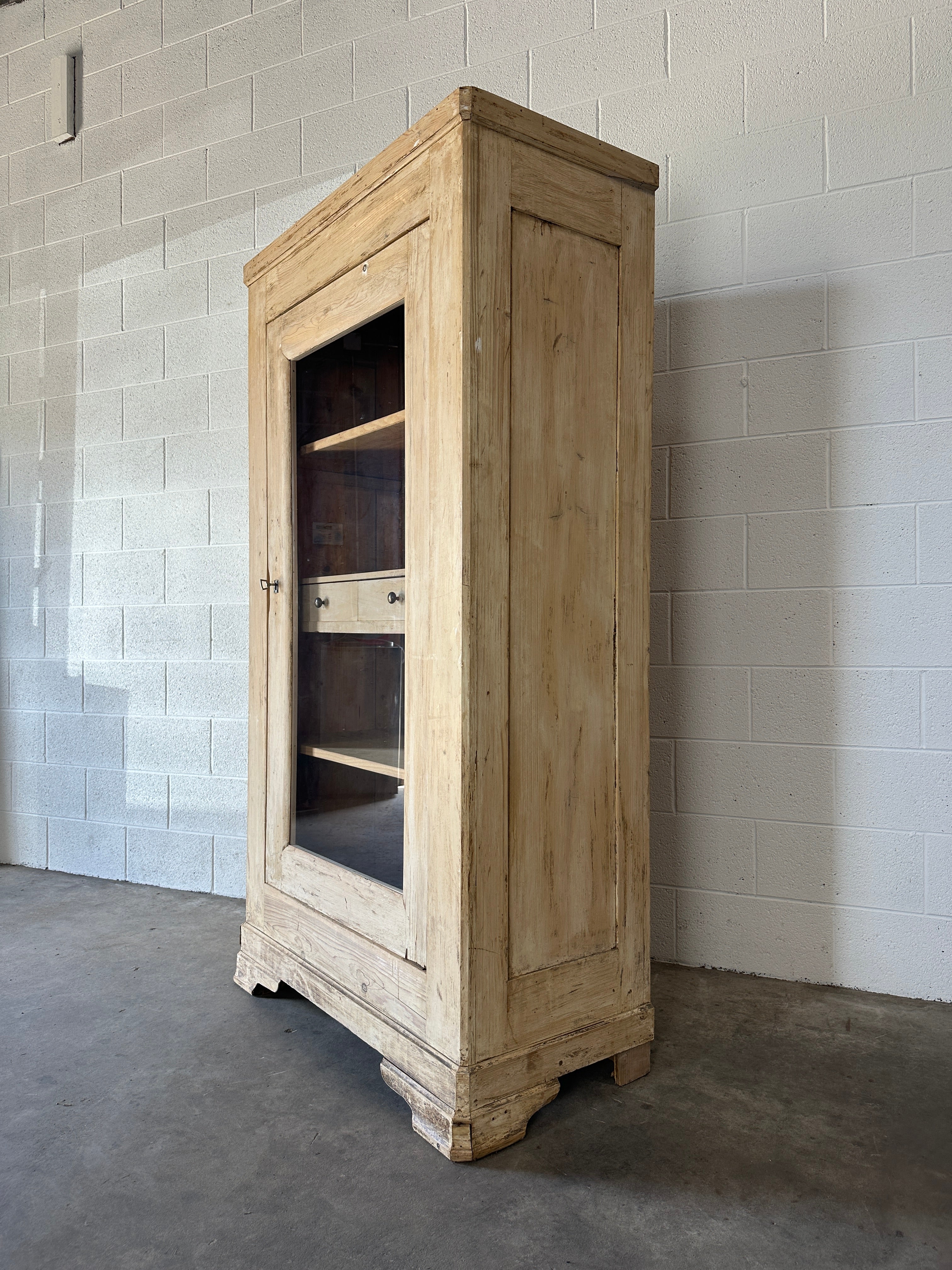 Antique French cupboard with glass door