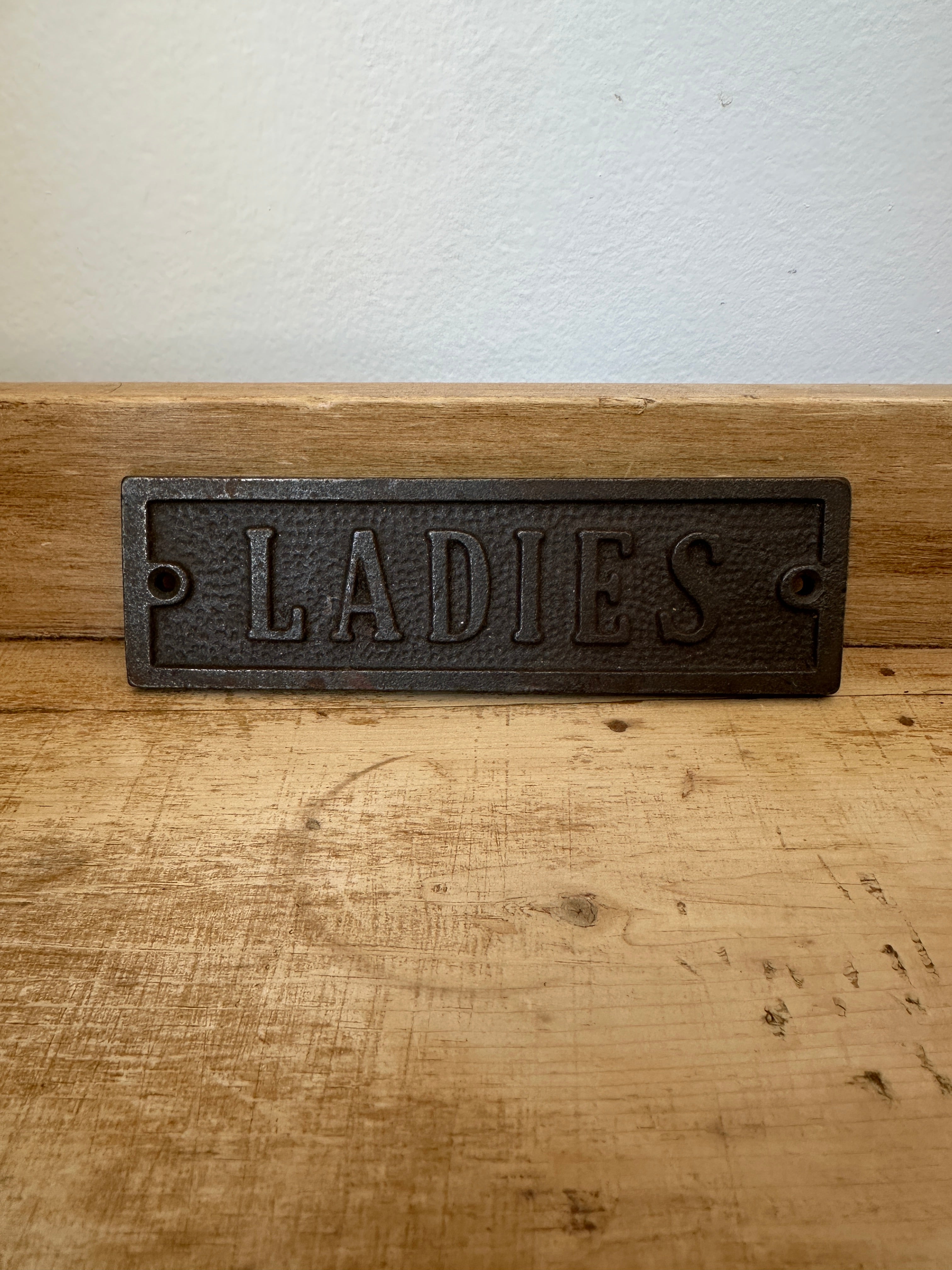 Antique ladies sign