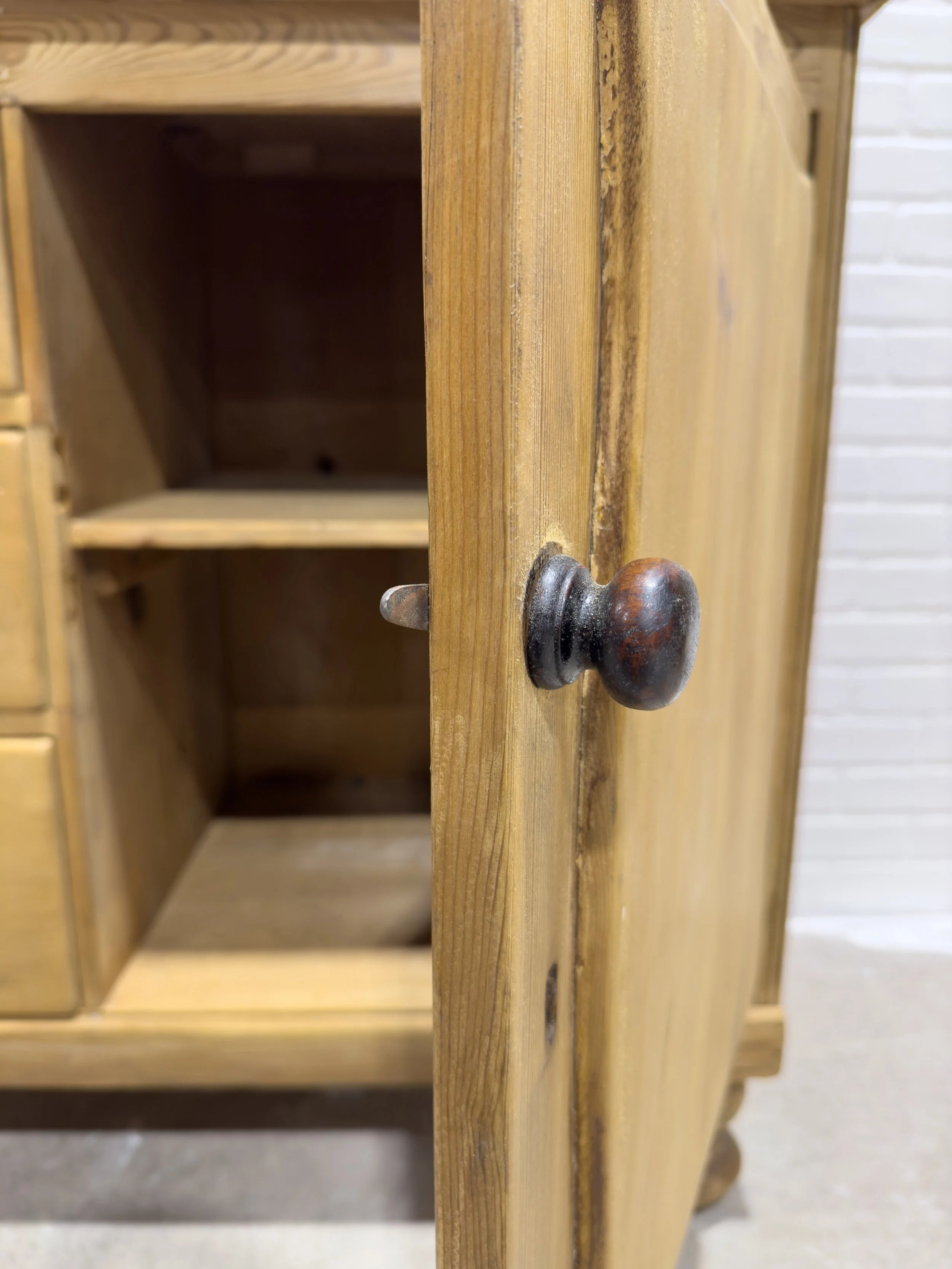 Victorian pine sideboard with dark knobs