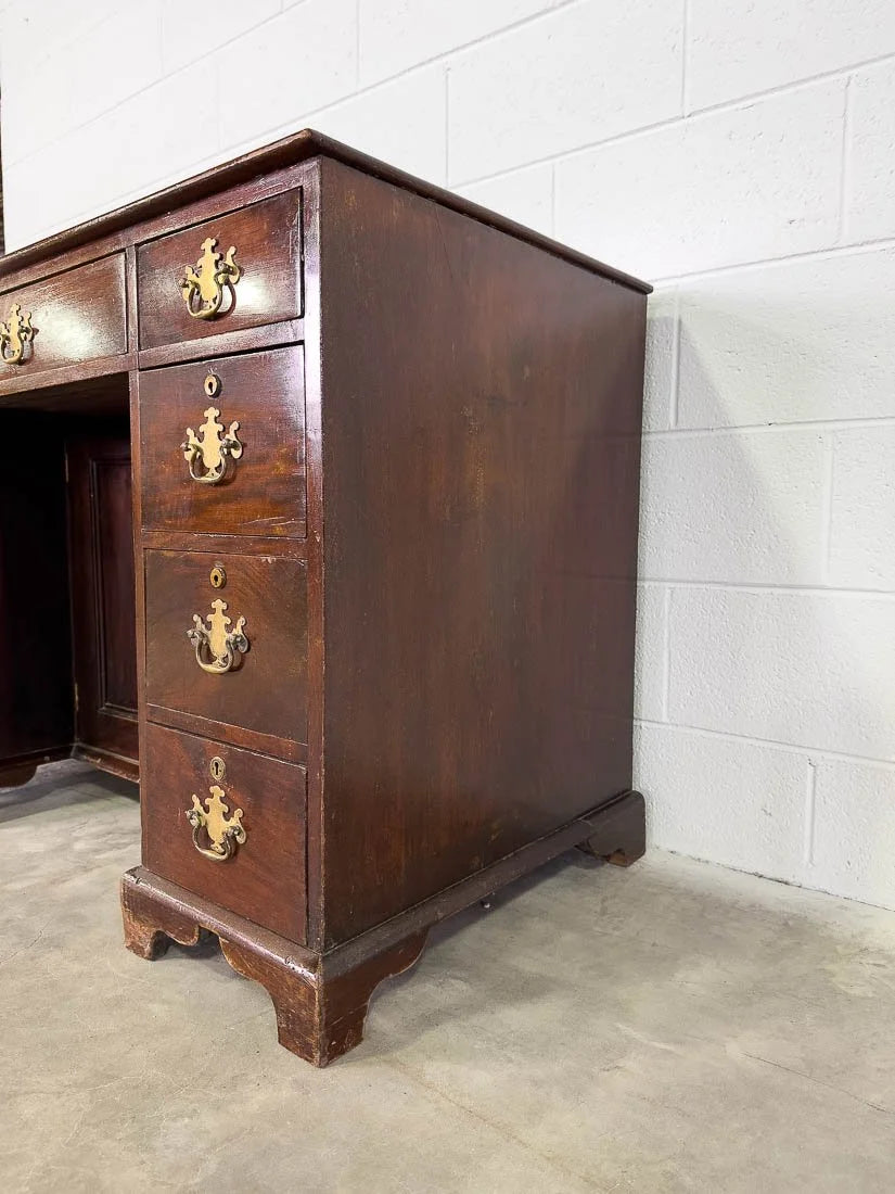 Antique English mahogany desk with cupboard below