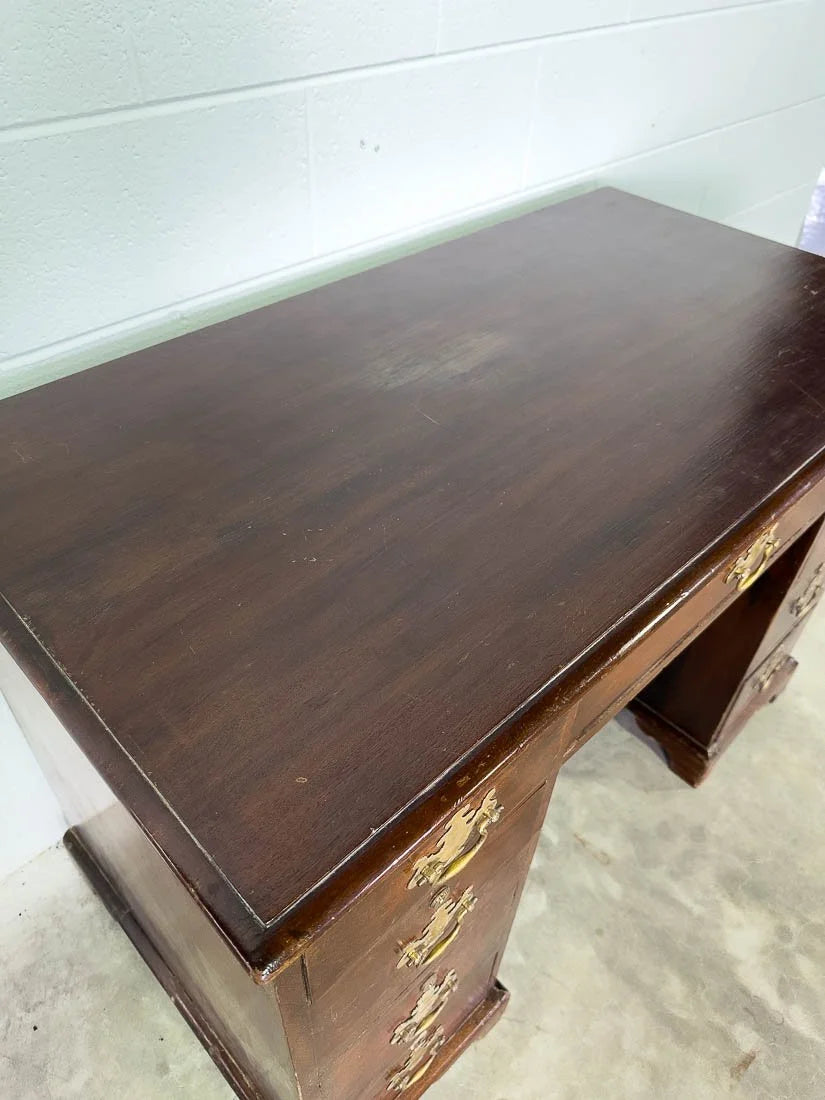 Antique English mahogany desk with cupboard below