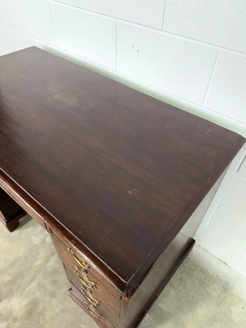 Antique English mahogany desk with cupboard below