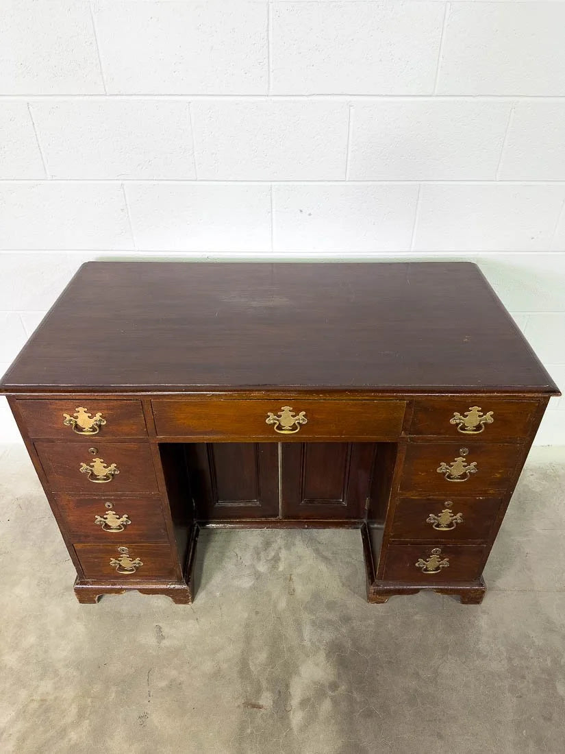 Antique English mahogany desk with cupboard below