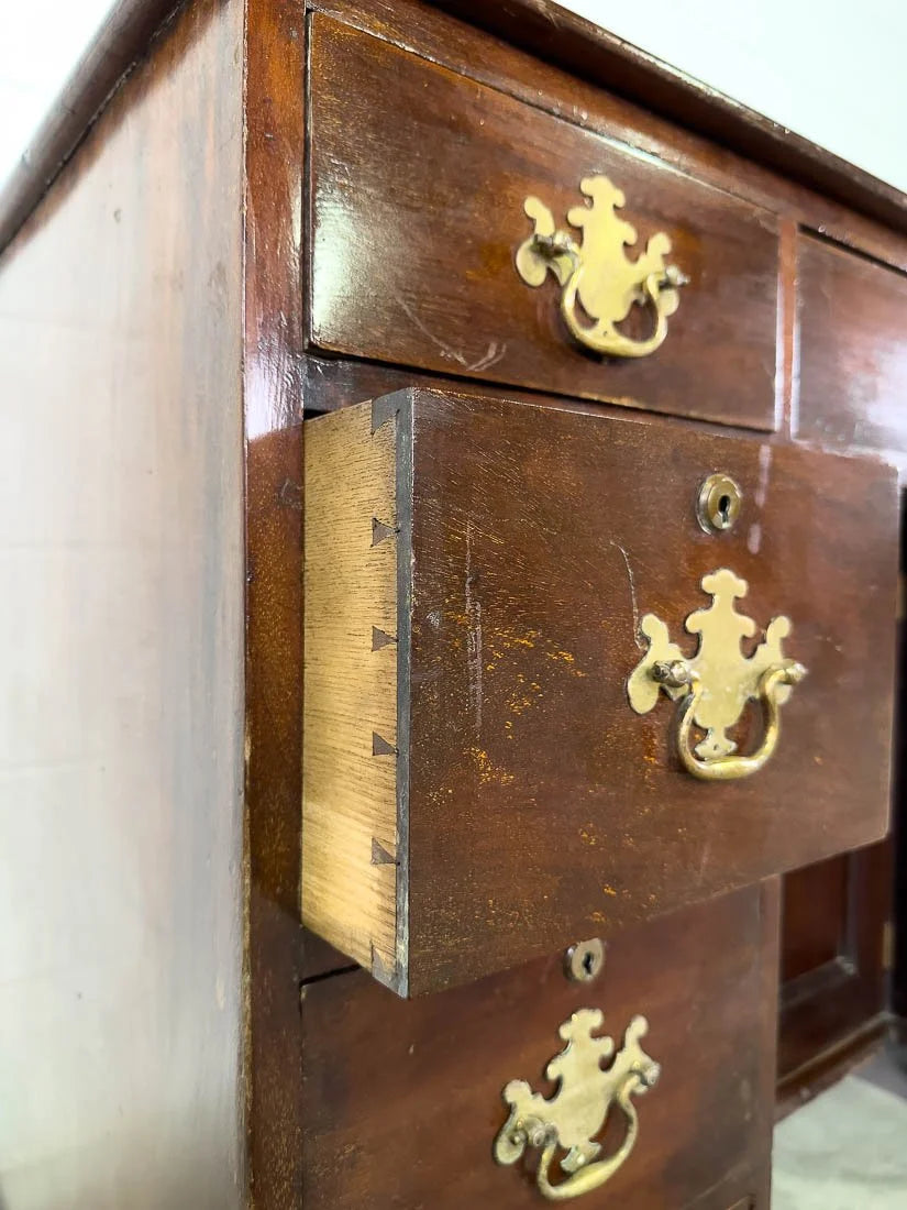 Antique English mahogany desk with cupboard below